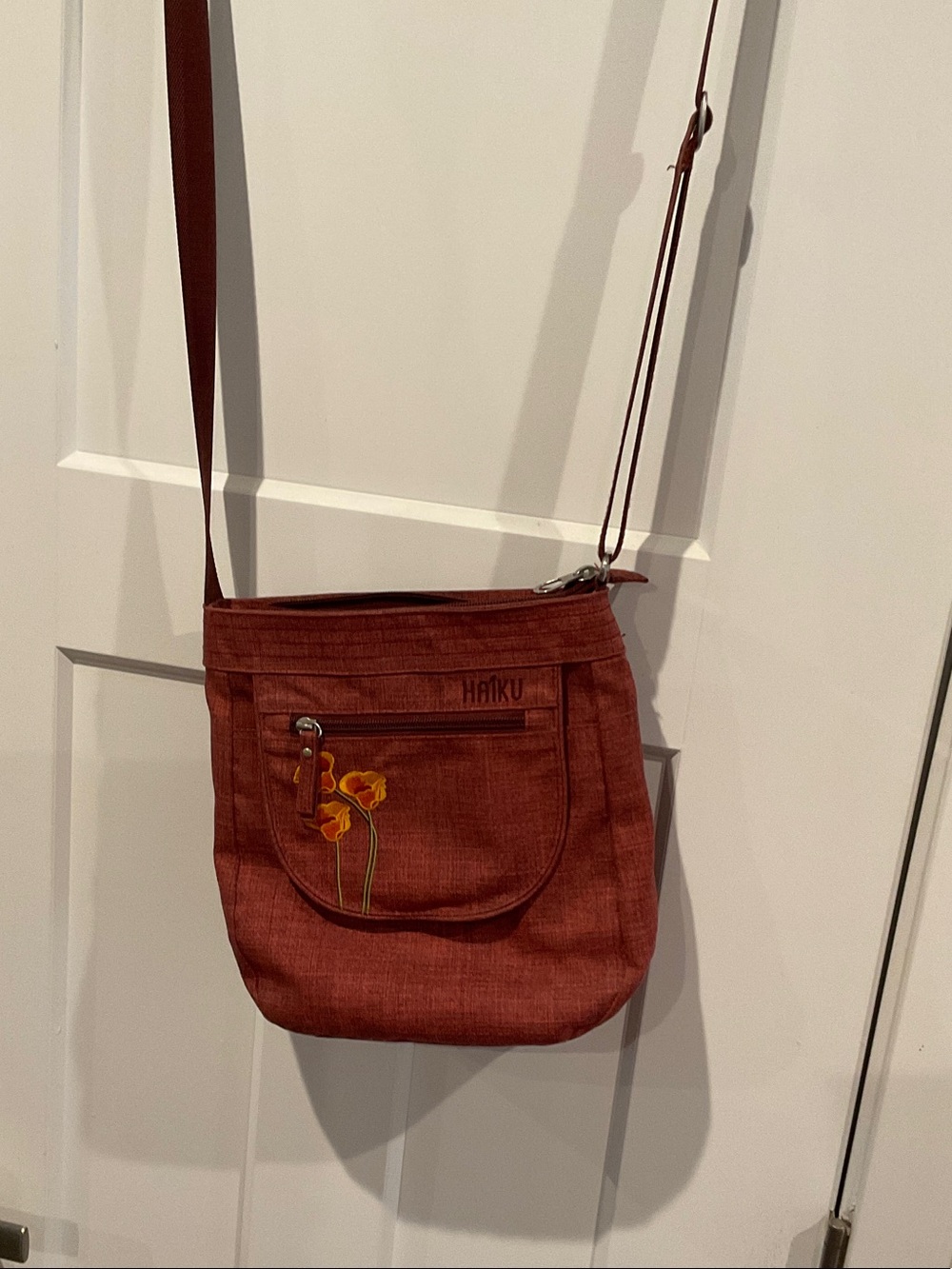 Haiku poppy berry Crossbody Bag with orange Floral Accent